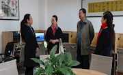 中残联一行莅临西固区图书馆检查指导工作